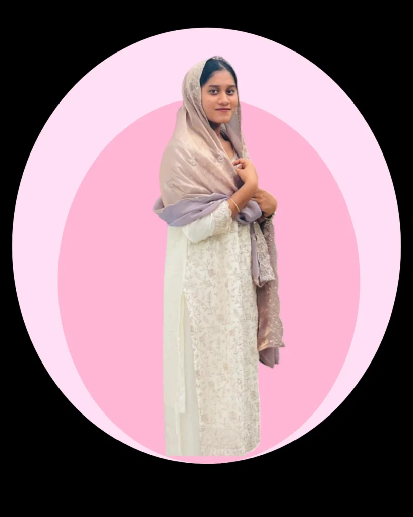 A Digital Marketer wearing a traditional light-colored dress with a shawl draped over her head, standing against a pink circular background. Best freelance digital marketing analyst in calicut.